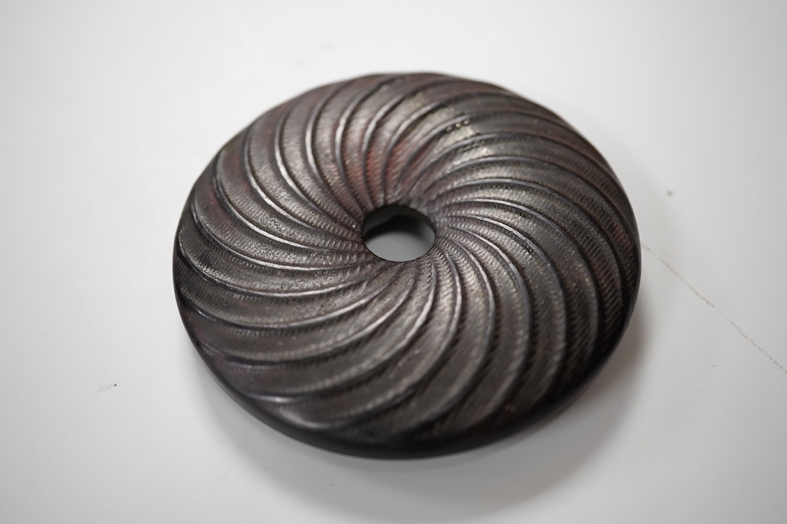 A Chinese pottery jug, two hardstone discs and a metal seal. Jug 17.5cm high